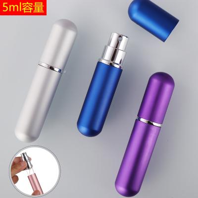 China Round 5ml Cosmetic Head Anodized Metal Aluminum Shell Coating Glass Perfume Bottle for sale