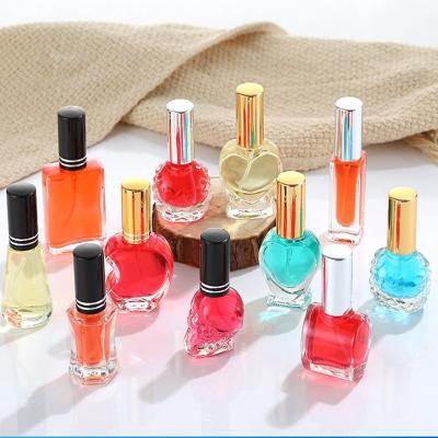 China Heart Apple Pentagon 8ml Cosmetic Skull Mini Perfume Bottles Portable Refill Perfume Spray Mini Glass Bottle for sale