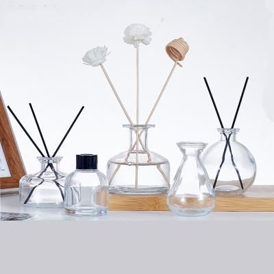 China Cosmetic Explosion 100m, L200ml330ml Round Perfume Essential Oil Aroma Diffuser Glass Stain Bottle for sale