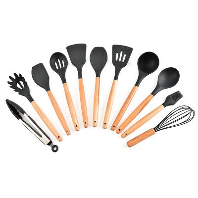 China Amazon Sustainable Hot Selling Wooden Handle 11pcs Silicone Kitchen Utensil Set for sale