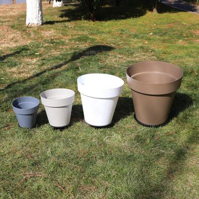 China 2022 Durable cheap hot sale good quality garden base indoor outdoor yard material 2022 round shape plastic flower pot for sale