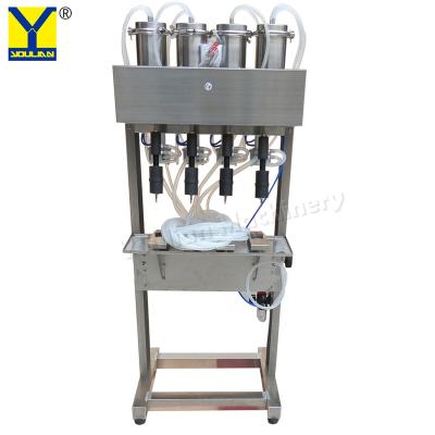 China YT-4 Pneumatic White Wine Filler Vaccum Liquid Glass Bottle Filling Machine en venta