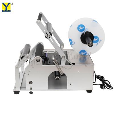 China MT-50C Semi Automatic Round Wine Bottle Paper Sticker Labeling Machine for PET Bottles Cans Jars for sale