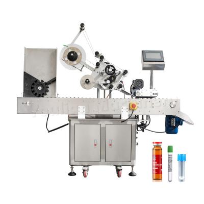 China MT-300 Automatic Horizontal Small Bottle Labeller Cosmetic Lipstick Plastic Tube Adhesive Labeling Machine Te koop