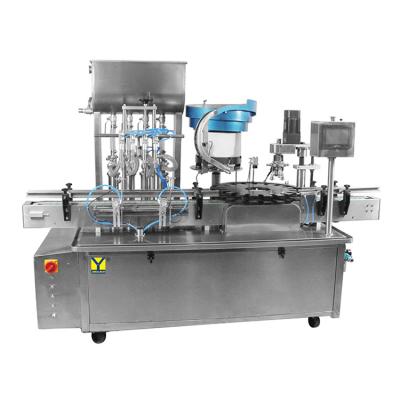 China YTSP500 Fully Automatic 4 Head Rotary Vial PET Bottle Oill Washing Filling Capping Machine Te koop