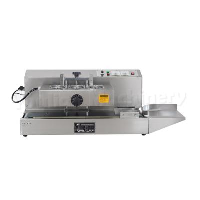 China LGYF-1500 High Quality Continuous Electromagnetic Induction Cap Aluminum Foil Jar Bottle Sealing Machines for sale