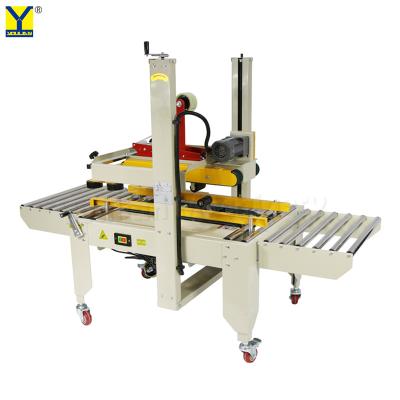 China FXA6050 Semi Automatic Electric Tape Box Carton Case Sealer Stripping and Sealing Machine zu verkaufen