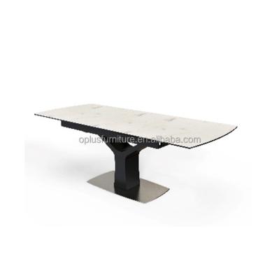 China Stone Black Ceramic Sinter Metal Base Extendable Dining Table Newest Living Home Modern Design Extendable Luxury Furniture for sale