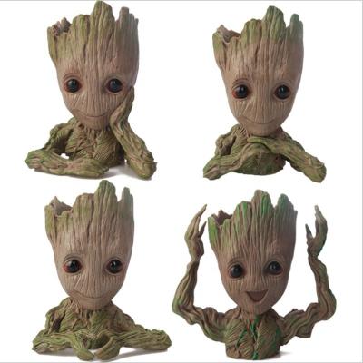 China DOULUO Eco-Friendly Groot Toy Hand Up Pen Flower Pot Stock Number Baby Groot Flower Pot guardianes de la galaxia for sale