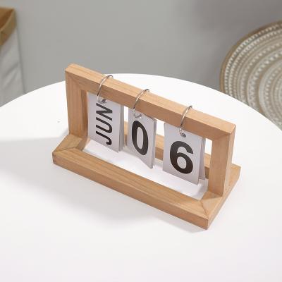 China Creative Wooden Perpetual Desktop Calendar Flip Ring Table Calendar with Stand for sale