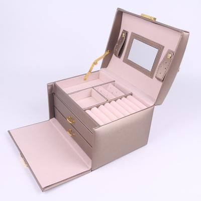 China Morden PU Jewelry Storage Box High-end Luxury Gold Leather Box Ring Necklace Watch Jewelry Storage Box With Mirror Packing for sale