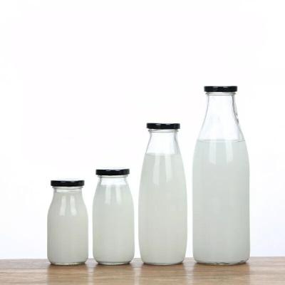 China Wholesale 200ml250ml500ml1000ml Beverage Juice Glass Empty Milk Bottle With Metal Plastic Cover for sale