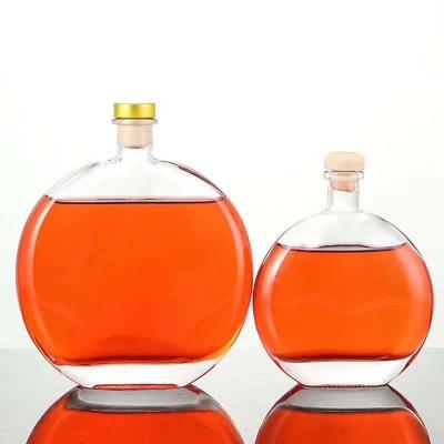 China Factory 200ml 500ml Empty Round Whiskey Vodka Drinking Bottle Beverage Thicken XO Glass Wine Bottle for sale