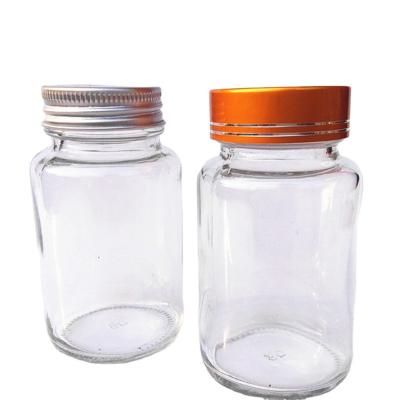 China 100ml medicine pill empty transparent glass vitamin capsule bottles for sale for sale