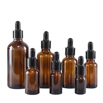 China Personal Care 10ml 15ml 30ml 50ml 100ml 150ml 200ml Essential Oil Amber Glass Bottle With Tamper Proof Lid And Reducer for sale