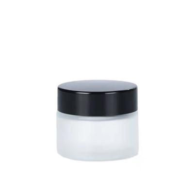 China Hot Selling Personal Care Container 15g 30g 50g 100g Empty Frosted Glass Cosmetic Jar With Silver Lid For Cream for sale