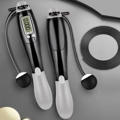 China Outdoor /Home Exercise Digital Jump Rope Adjustable Electronic Counting Abs Handle Skipping Rope With Weight Ball for sale