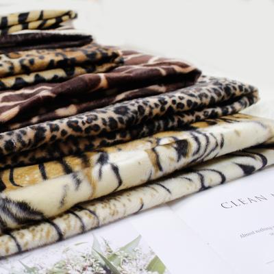 China Europe and America leopard print fabric sofa pillowcase fabric super soft short plush fabric HT-PVPF-A for sale