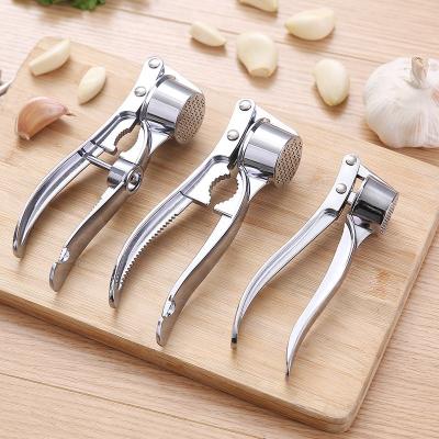 China Viable 3 Grades Multi-Functional Kitchen Tool Accessories Sliver Zinc Alloy Vegetable Fruit Vegetable Instruments Rising Manual Garlic Press for sale