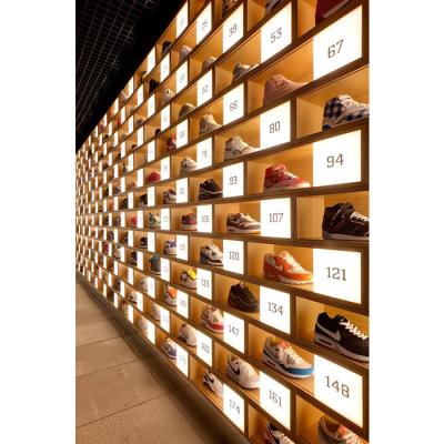 China Attractive Popular MDF+Metal Bespoke Display Fixture For Shoe Shop Decoration Design For Boot Display Stands for sale