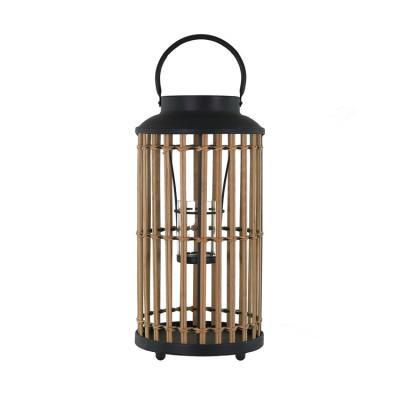 China Modern Art Unique Classical Rattan  Woven Candle Holder With Handle Outdoor And Indooe Both Wooden Lantern for Home decor for sale