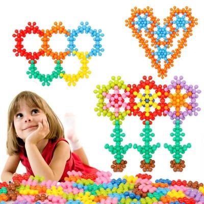 China Diy Snowflake Plum Blossom Building Blocks 3D Building Block DIY Puzzle STEM Educational Interlocking Assembly Building Toy for sale