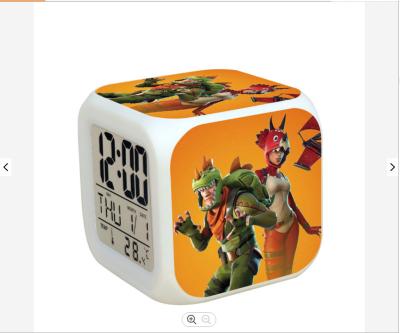 China Cartoon Unicorn Alarm Clock Kids LED Night Light Calendars Changing Electronic Digital Pendulum Desk Clock for sale