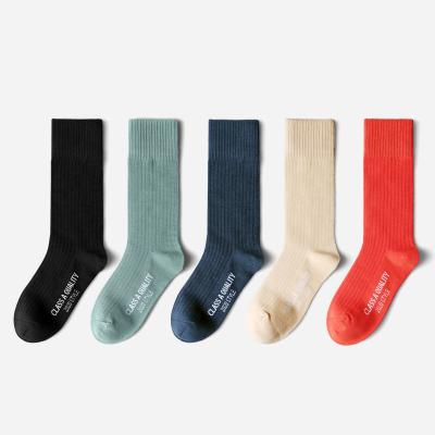 China Breathable Factory Designed Plain Color Knitted Tube Logo Crew Cotton Socks For Women for sale