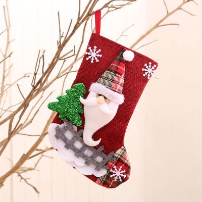 China Flannel Christmas Stockings Felt Decorative Gift Sack Party Treat Christmas Tree Hanging For Xmas Party Festival Birthday for sale