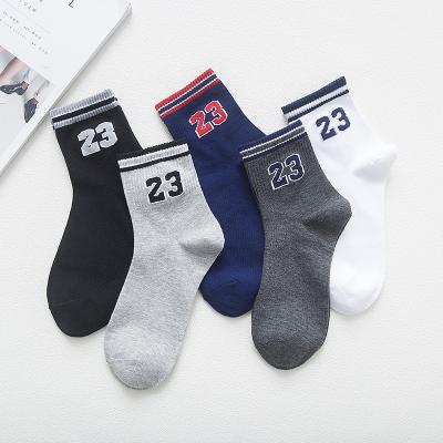 China Breathable OEM Custom Design Novelty Casual Cotton Unisex Sports Jacquard Tube Crew Socks for sale