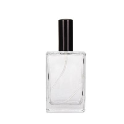 China Personal Care 50ml Clear Glass Perfume Bottle With Pump Sprayer for sale