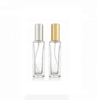 China Personal Care 15ml Clear Perfume Bottles Glass Spray Empty Square Shaped Perfume Bottle With Gold Mist Sprayer Pump for sale