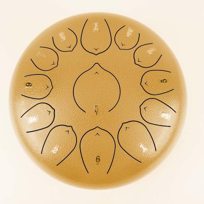 China Yoga Supply The 12inches 13tones Golden Instrument Percussion Skein Drum For Yoga Steel Tongue Drum for sale