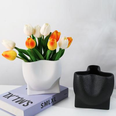 China Modern White Black Creative Design Europe Wedding Decoration Irregular Ceramic Flower Vase For Decor Home Office Desk Ornaments for sale