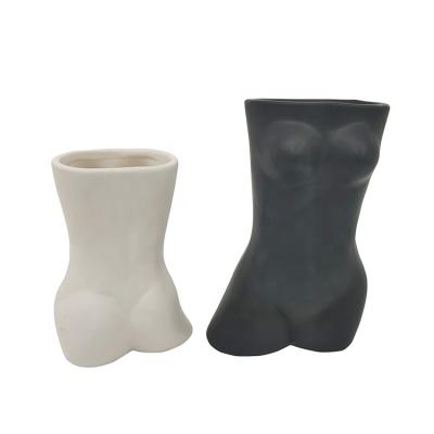 China Minimalist Nordic style plant table containers butt vase shaped creative ceramic female body shaped vase for sale