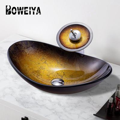 China Chinese Style Aluminum Bathroom Golden Oval Washroom Hotel Use Glass Sink Basin With Waterfall Faucet for sale