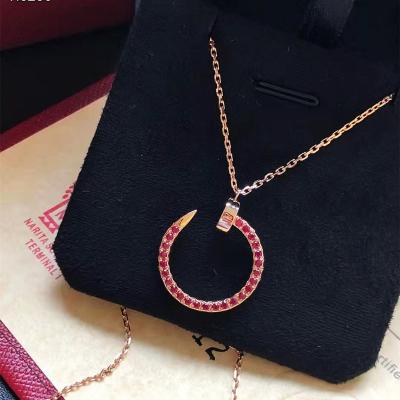 China Fashionable red nail necklace ladies CZ zircon gold stainless steel jewelry accessories brand designer designer supplier factory pendant necklace for sale