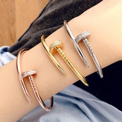 China Classic Luxury Gold Plated Stainless Steel Mens 18k Gold Plated Bangle Plain Nail Bracelets Womens Designer Jewelry Bangles Nail Bangle for sale