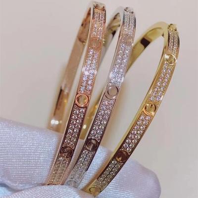 China Famous Brand Ladies Designer Women's CZ Zircon Stainless Steel Fashion Jewelry Love Screw Crystal Bangle Bracelet for sale