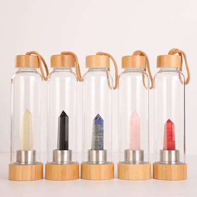 China Viable Natural Crystal Stone Point Crystal Wands Infused Gemstone Crystal Glass Water Bottle for sale