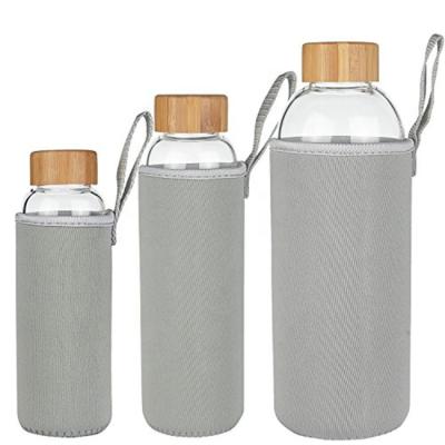 China 2021 Sustainable BPA Free Break Borosilicate Glass Resistant Water Bottle With Protective Neoprene And Bamboo Sleeve Lid for sale