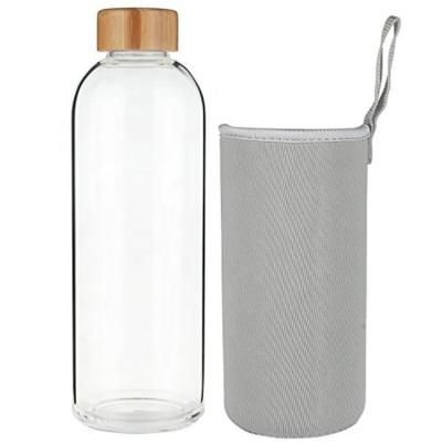 China High Quality Sustainable Borosilicate Bamboo Lid Glass Water Bottle With Neoprene Protective Sleeve for sale