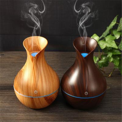 China Chinese Frankincense Essential Oil Diffuser with LED Night Light, Ultrasonic Aromatherapy Humidifier, Vase Shape Wood Grain Appearance 2021 Style New for sale