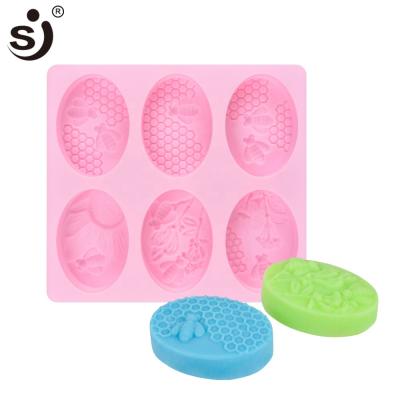 China New Design 6 Cavity Homemade Soap Application Disposable Oval Candle Mold Homemade Silicone Plastic Mold for sale