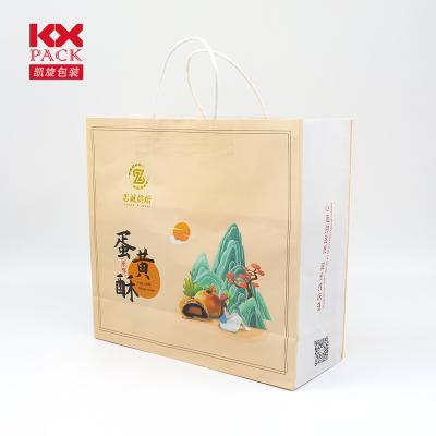 China Recyclable Customized Printing Handle Bags Square Bottom Kraft Paper Bag For Packaging for sale