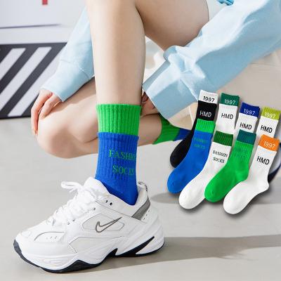 China Fashion disposable cotton thongs women's cycling sports striped alphabet socks street casual socks for sale