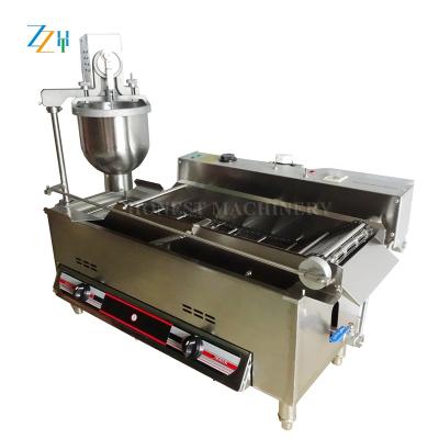 Chine Snack factory best quality machines for making donuts / full automatic donut machine à vendre