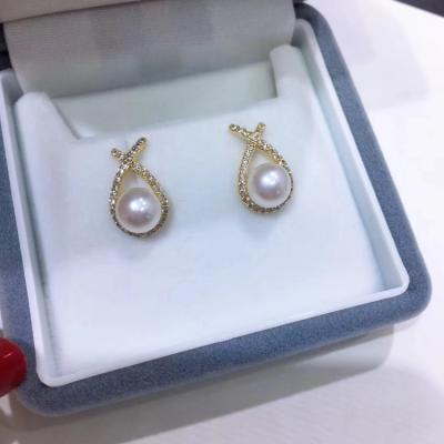 China Women's earring design the latest handmade silver imperfect natural freshwater baroque pearl jewelry elegant pearl earrings for sale