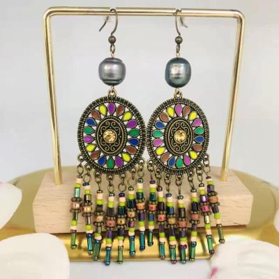 China BOHEMIA 2022 Handmade Bohemian Exaggerated Boho Seed Bead Disc Tassel Earrings For Women for sale