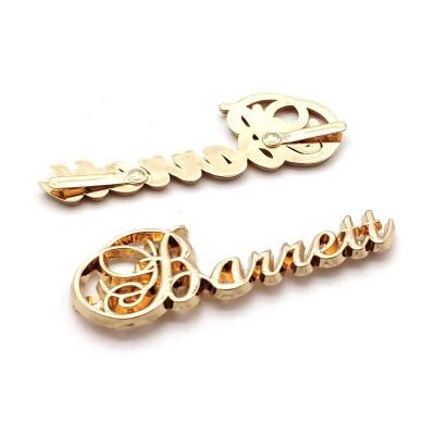 China Sustainable Factory Price Engraved Metal Name Tags Custom Brand Logo Metal Plated Labels For Clothing Garment for sale